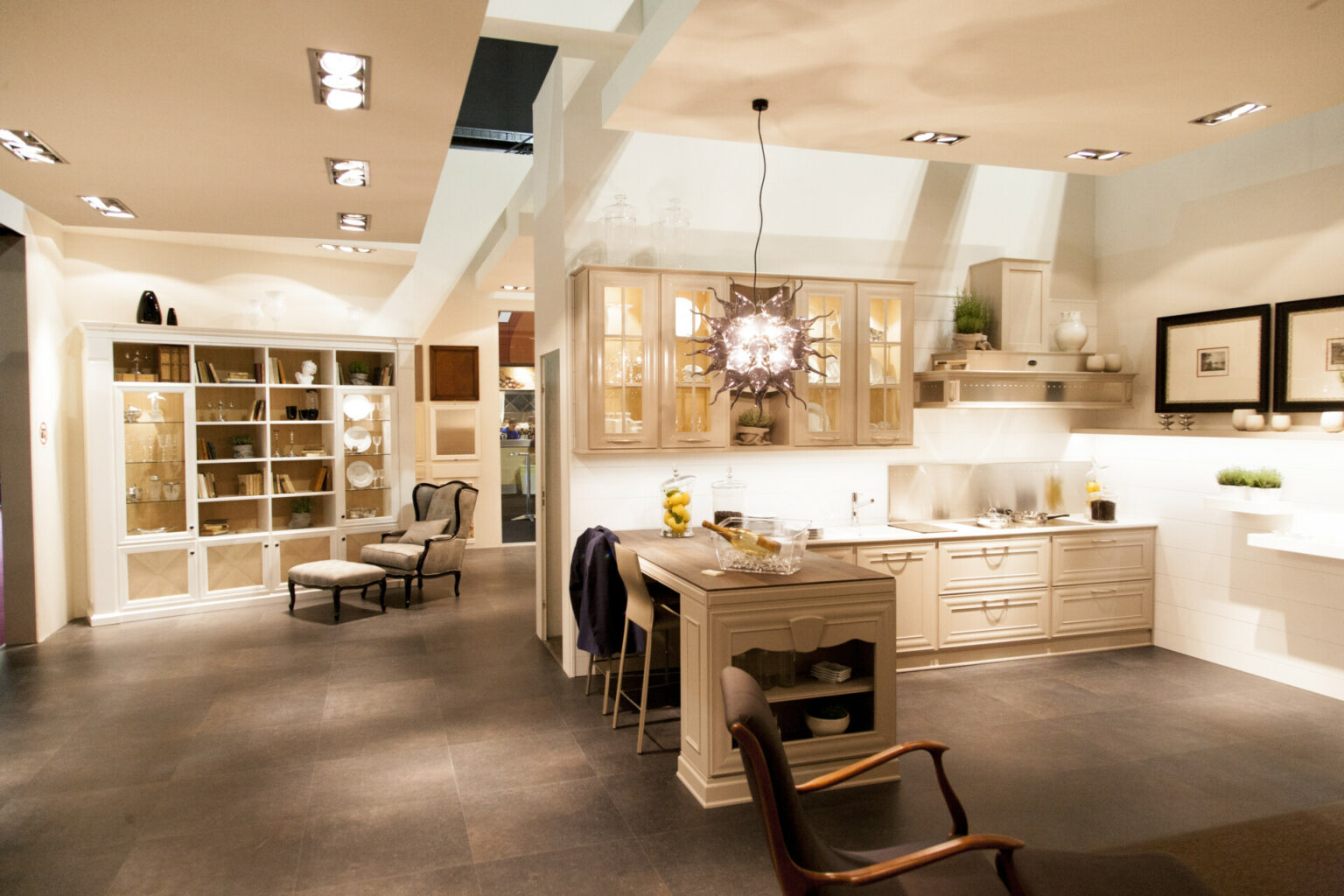 a kitchen with a table and chairs