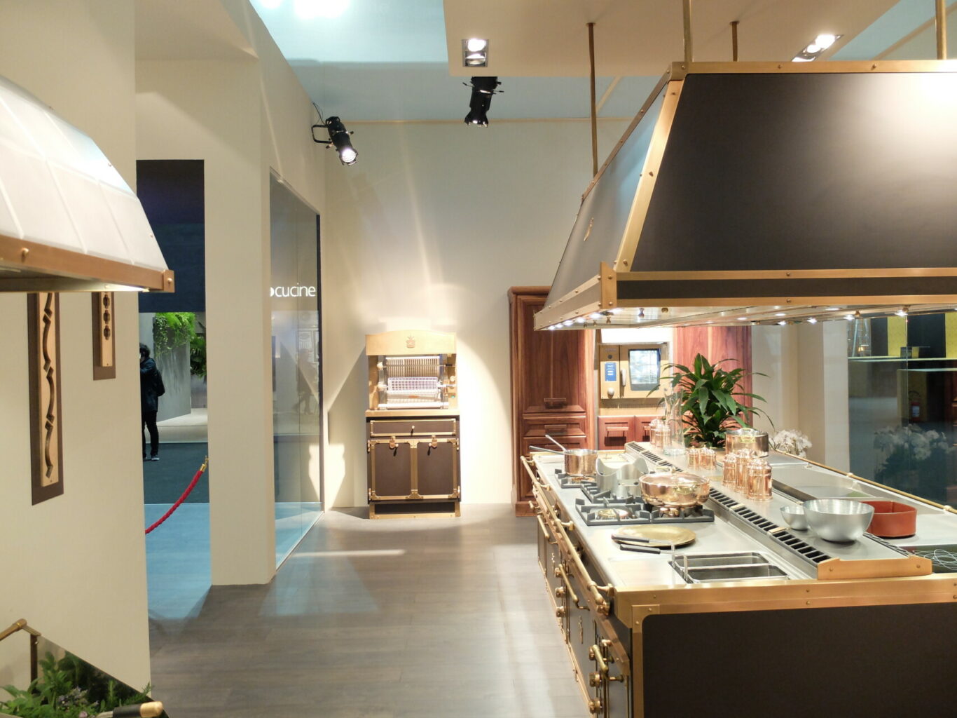 a kitchen with a large island and stove