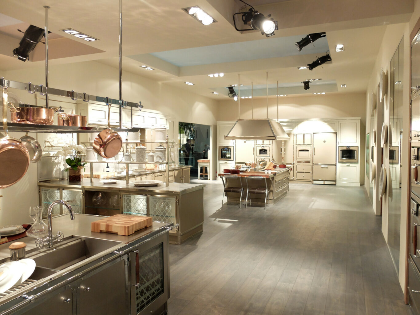 a large kitchen with stainless steel appliances