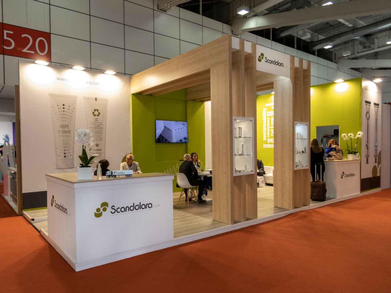 a booth with people sitting at the counter