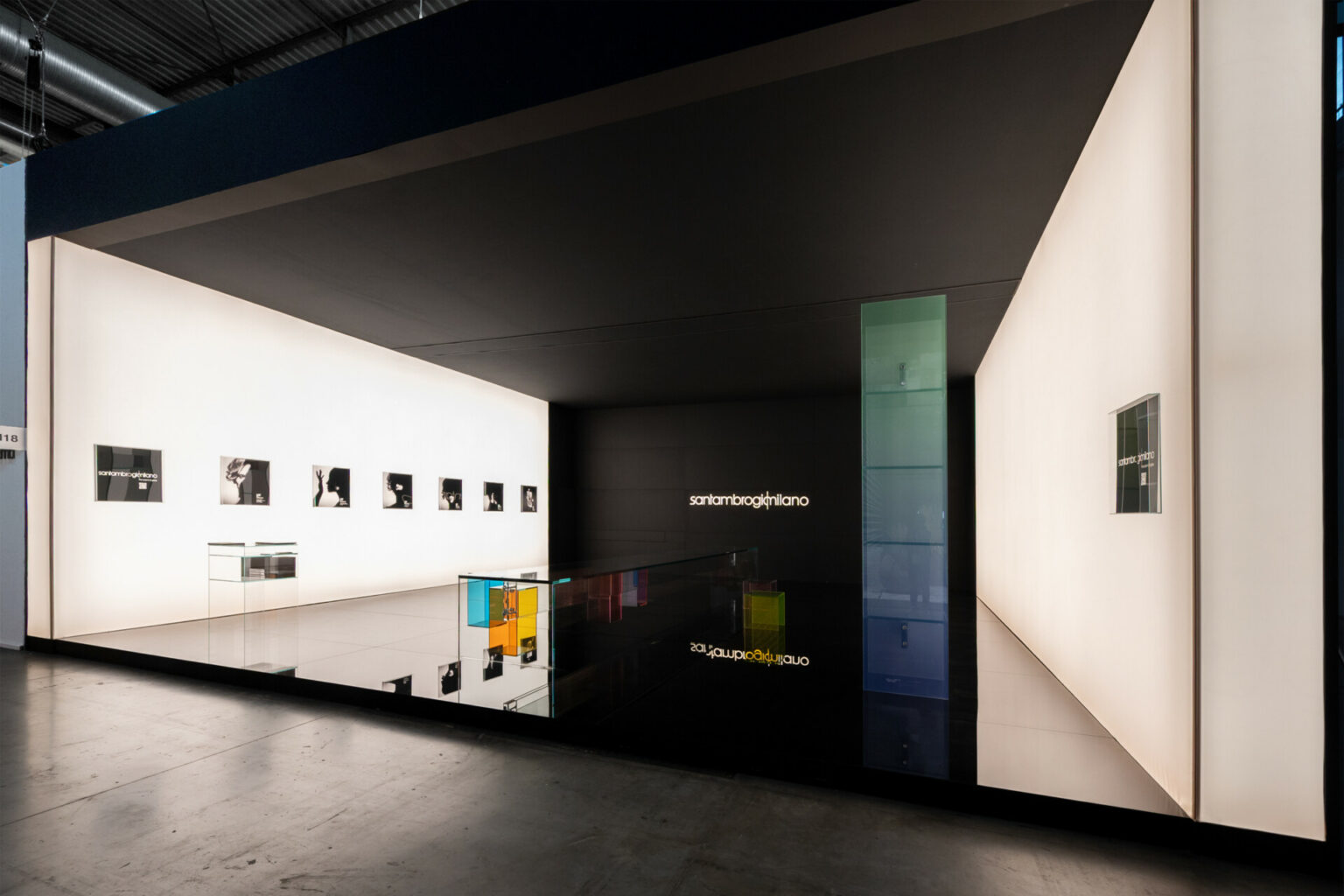 a room with a glass floor and a black wall