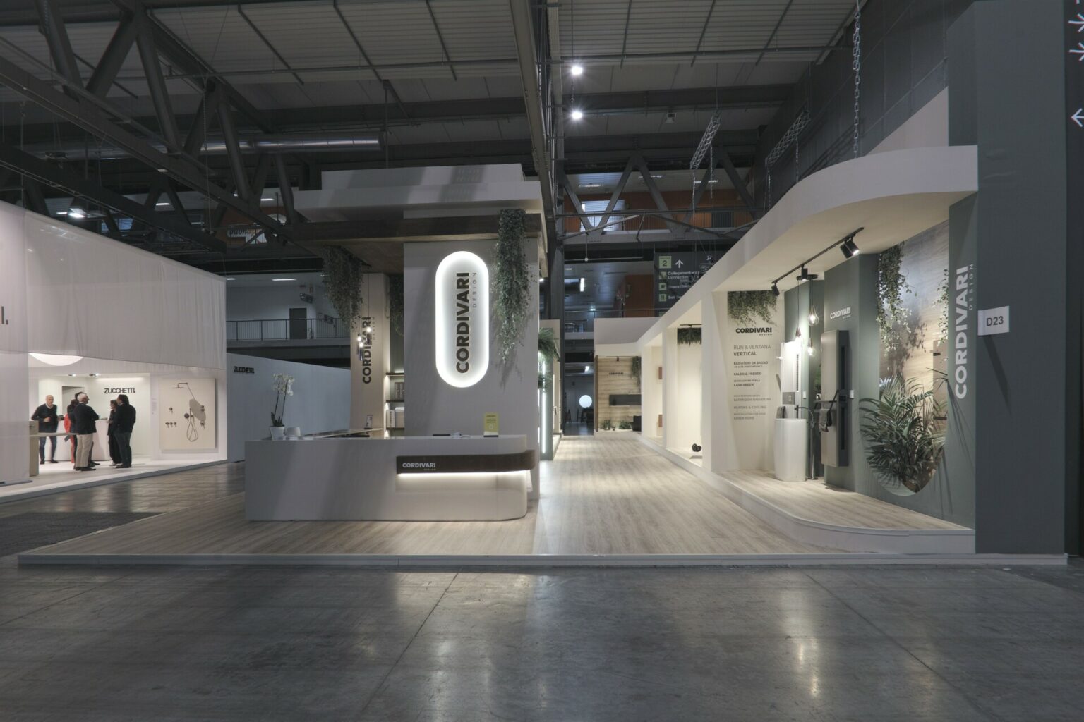 a room with a reception desk and a large ceiling