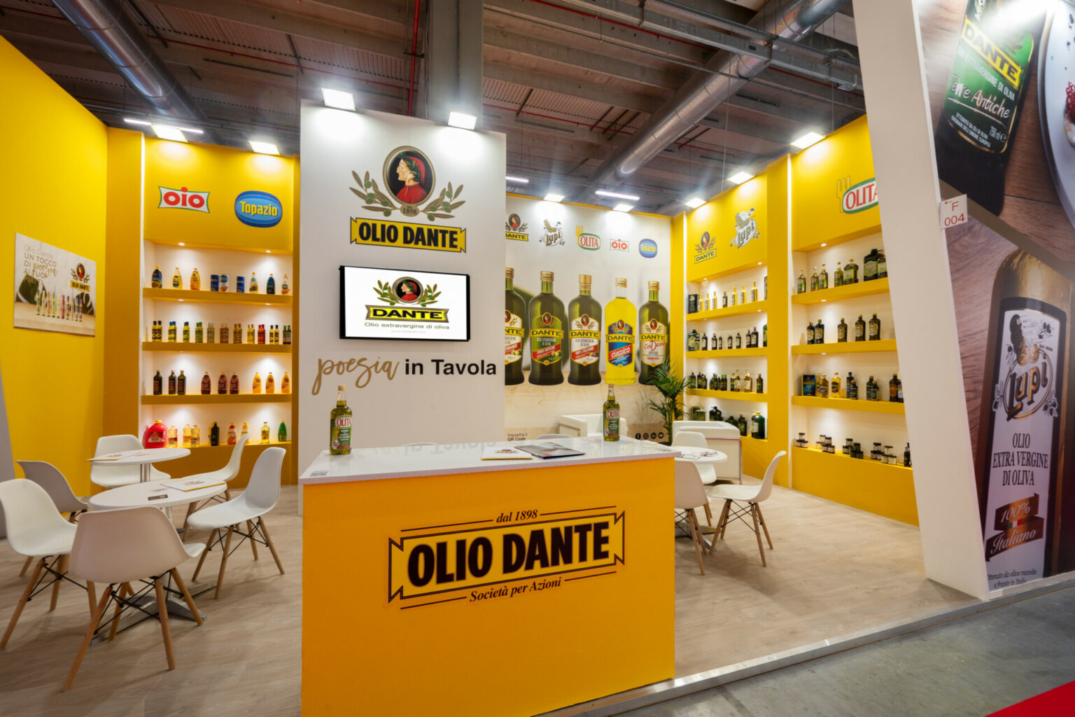 a yellow and white room with a counter and shelves of bottles