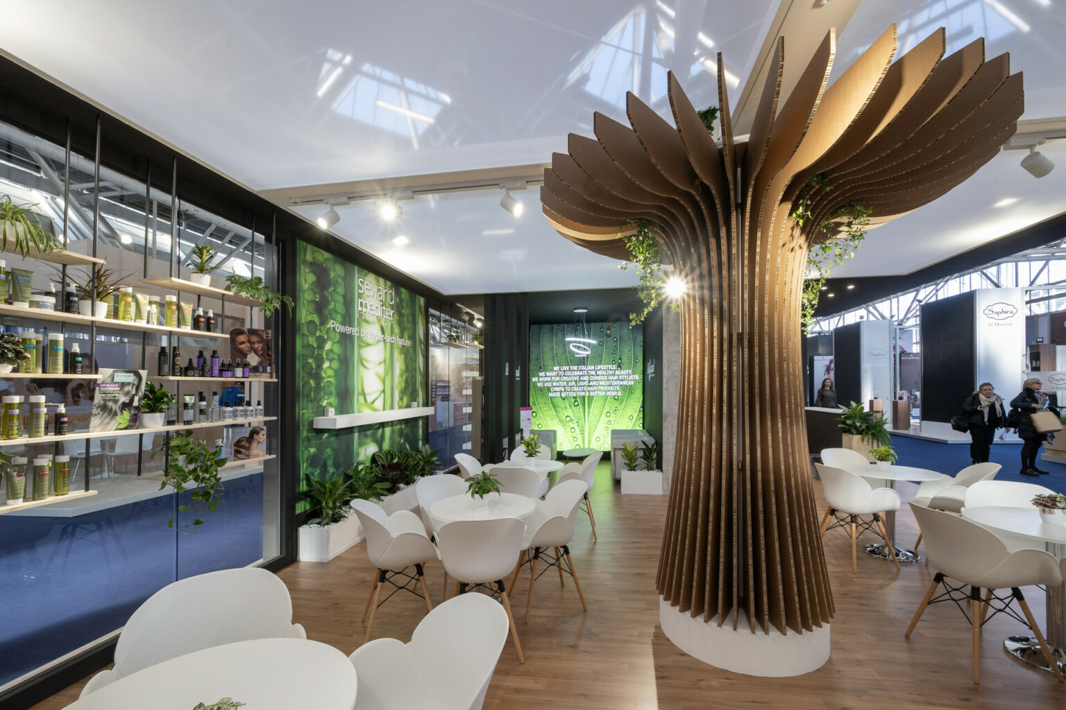 a room with white tables and chairs